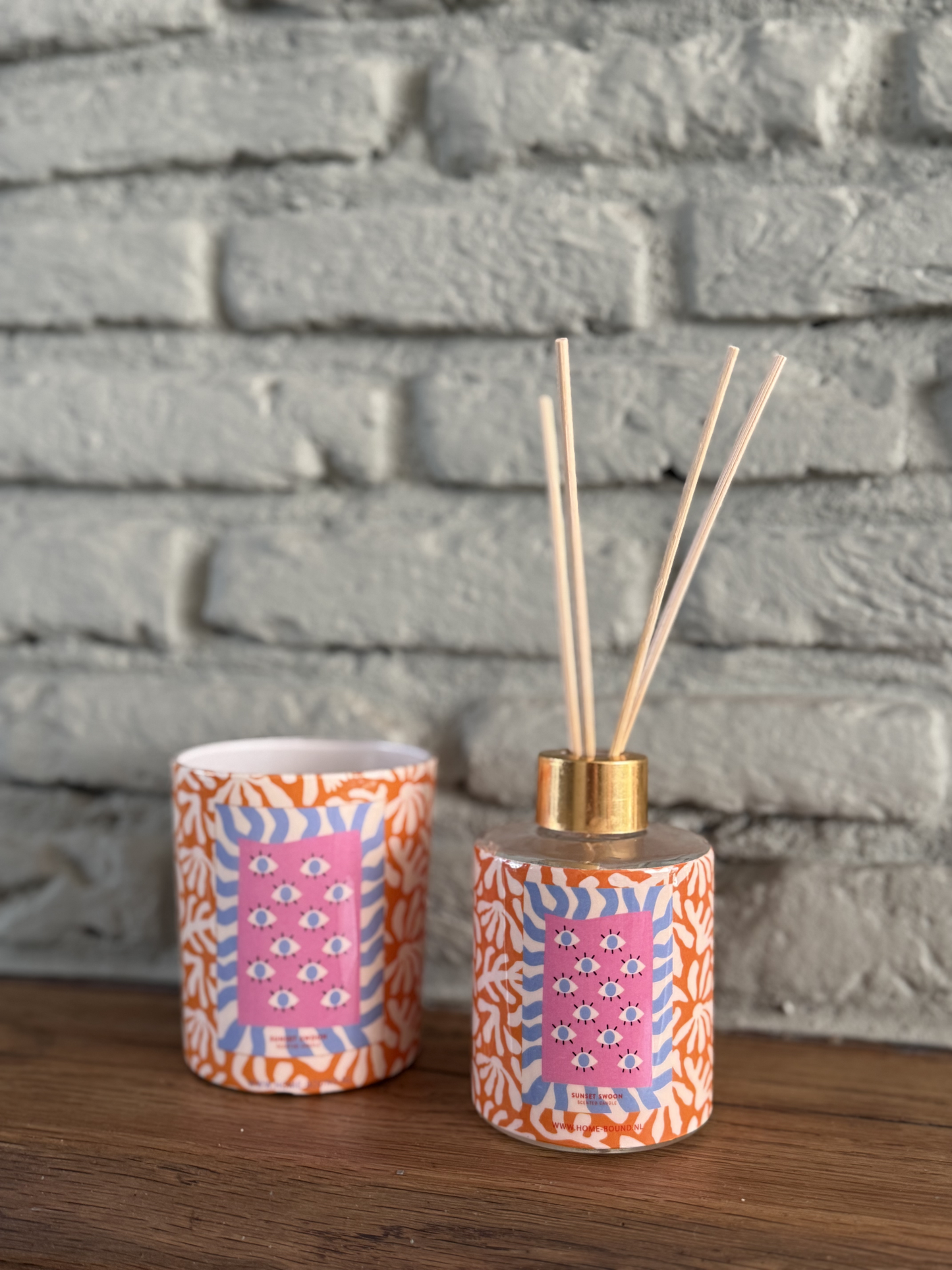 Sunset Swoon geurstokjes 150ml in amberkleurig glas.